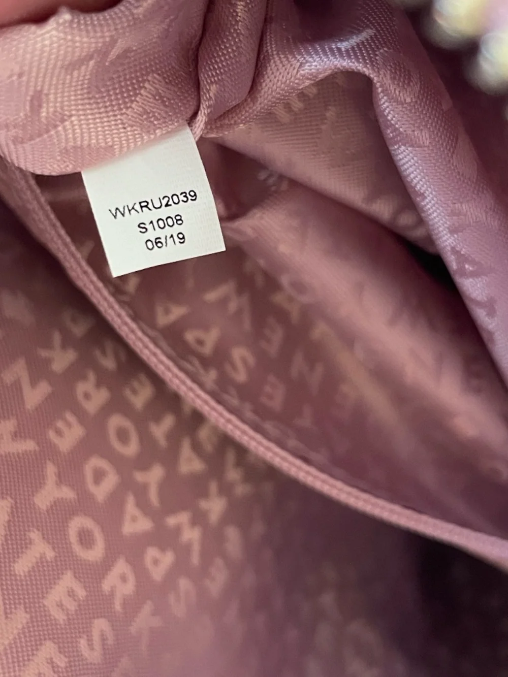 Kate Spade Newbury Lane Cammie crossbody bag in dusty peony pink